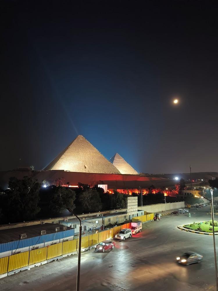 Maria Pyramids House