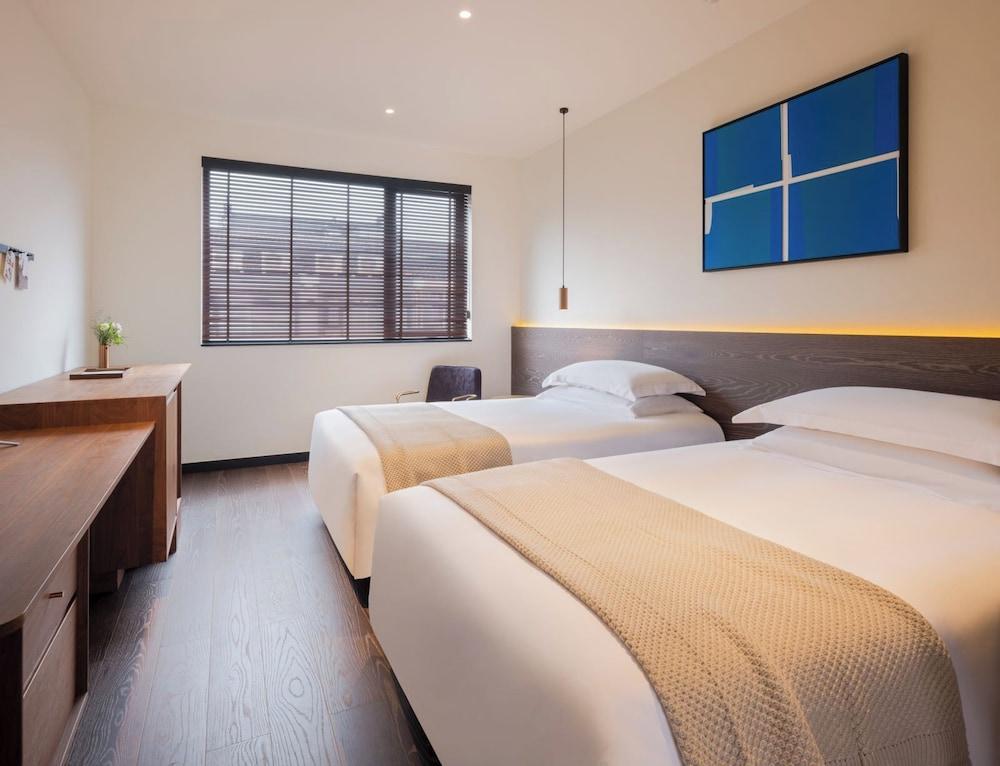 تان ألي ووتشين إيكو آند كالتورال كوميونيتي غرفة