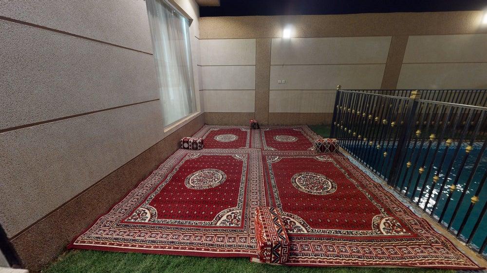 Comfy Istiraha with Pool | 231 Garden Seating Area
