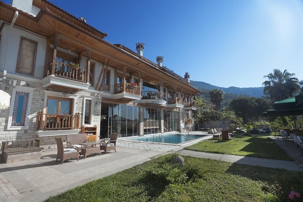 كيرم عثمان كوناك - بوتيك كلاس