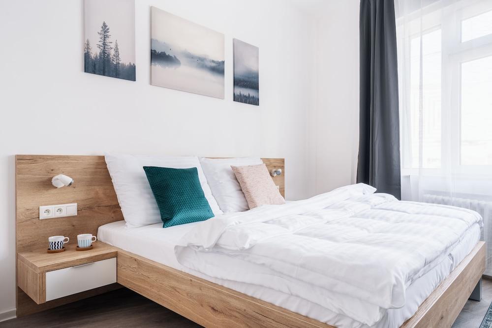 Self Check-in Apartments by Ambiente Featured Image