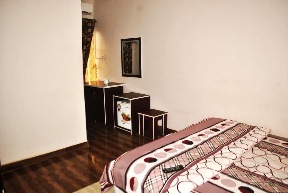 Global Place Guest Inn Room