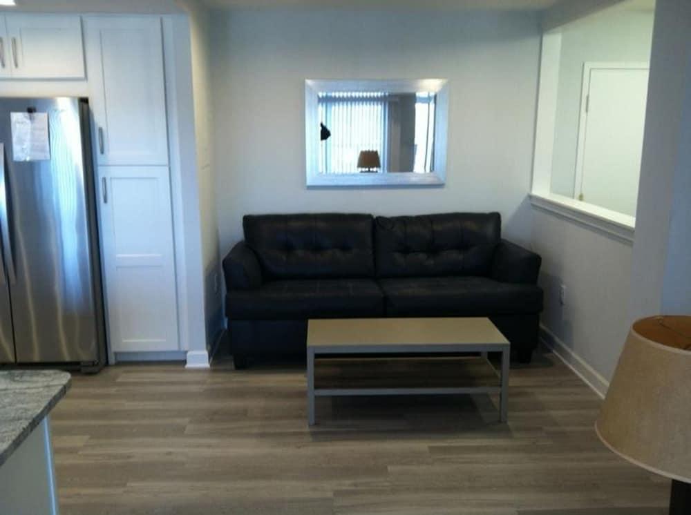Henlopen Unit 712 by Long & Foster Living Room