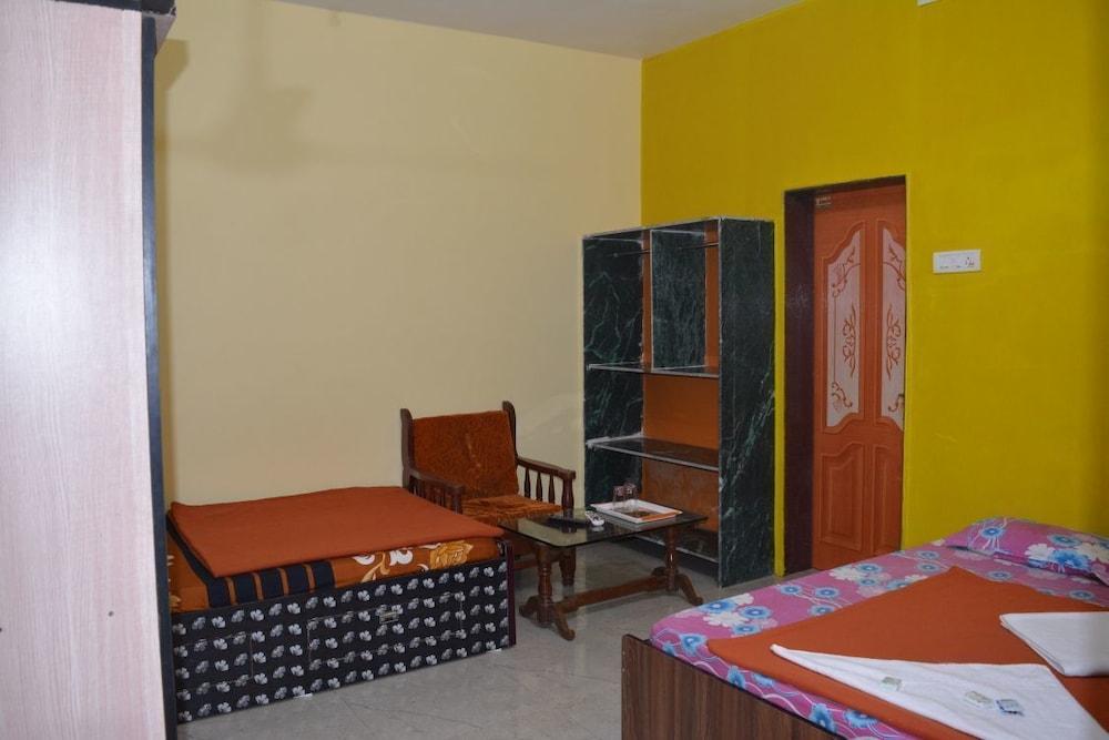 Atharv Resort Room