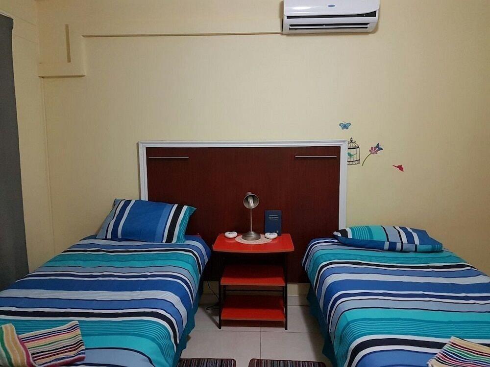 P Wake Guesthouse Room