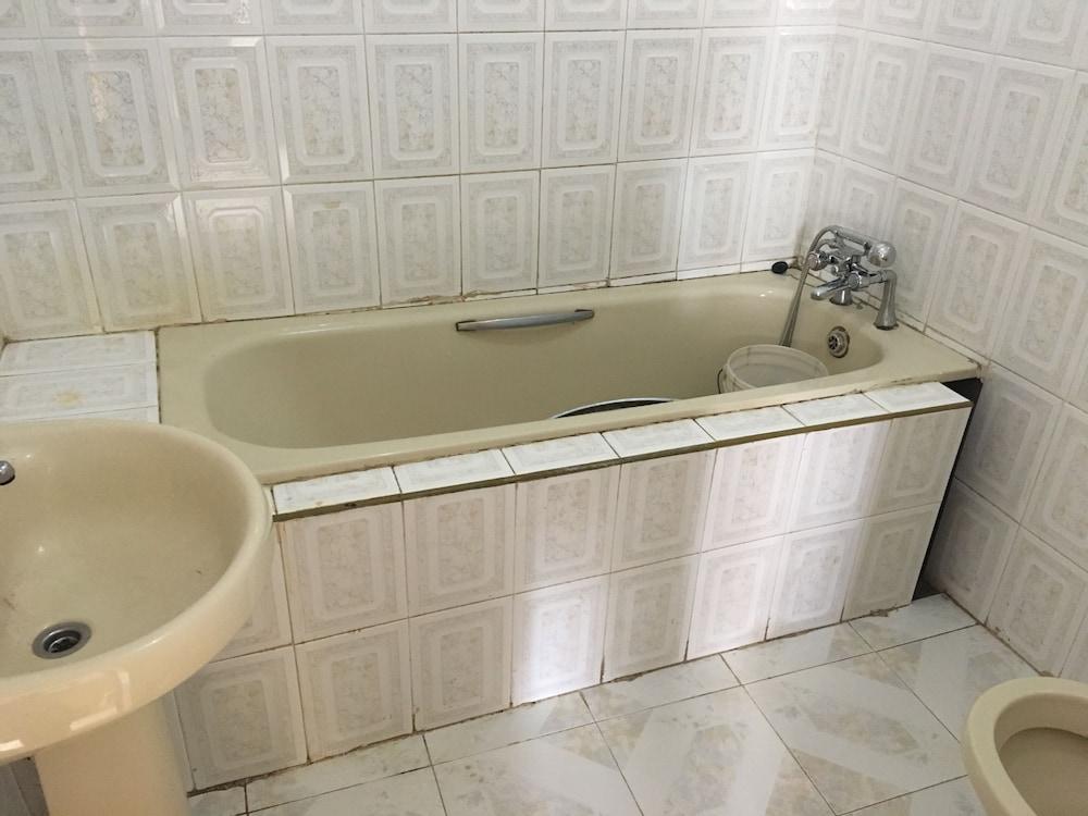 Conquer Yardie Bathroom
