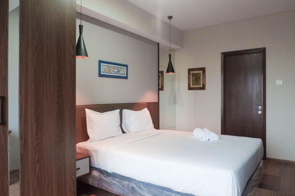 Classy 1BR Apartment with Pool View at Grand Sungkono Lagoon Room