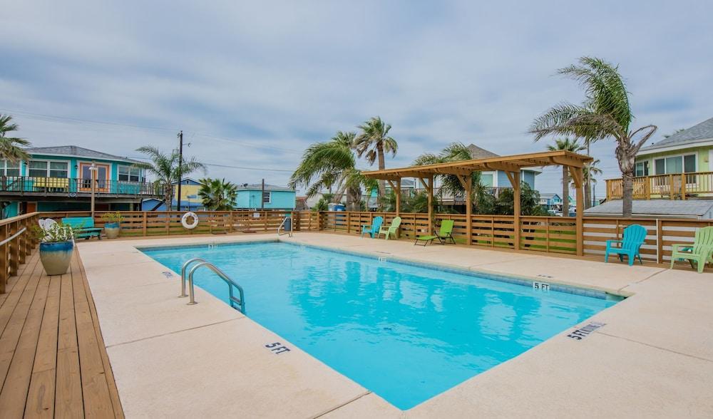 Island-style Beach Shak Home Steps to Community Pool by Redawning Waterslide