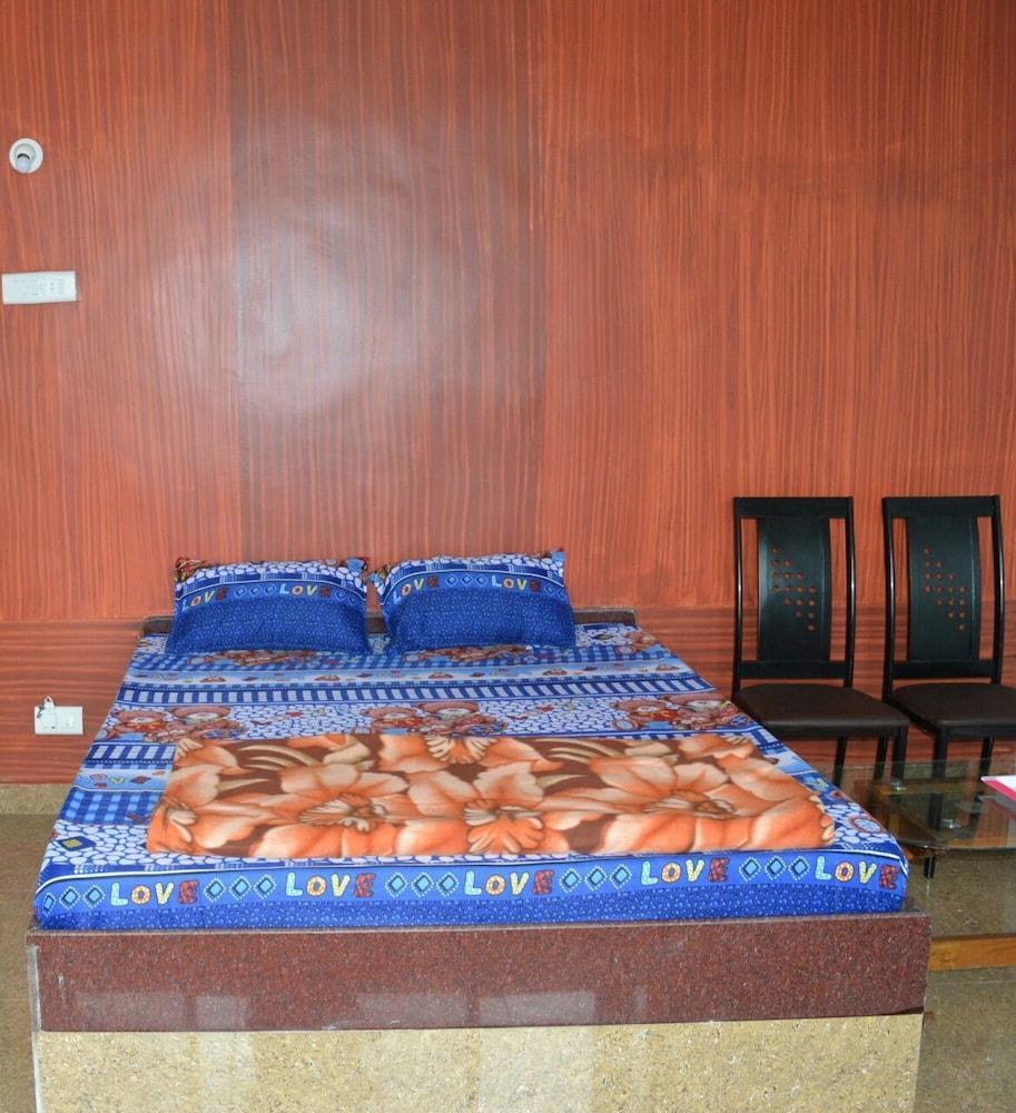 Atharv Resort Room