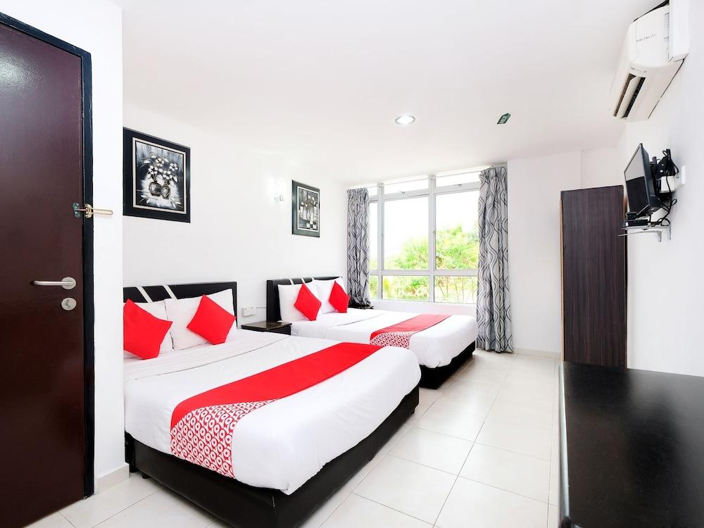 OYO 711 Tawaquf Inn Featured Image