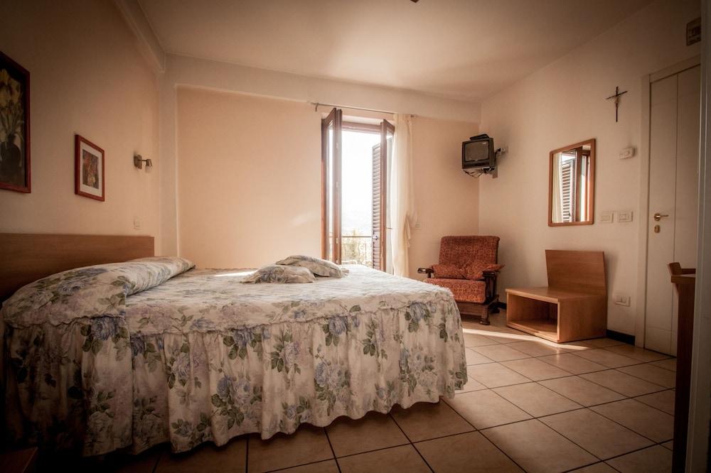 آلبيرجو ريستورانت بار بيرتوليني غرفة