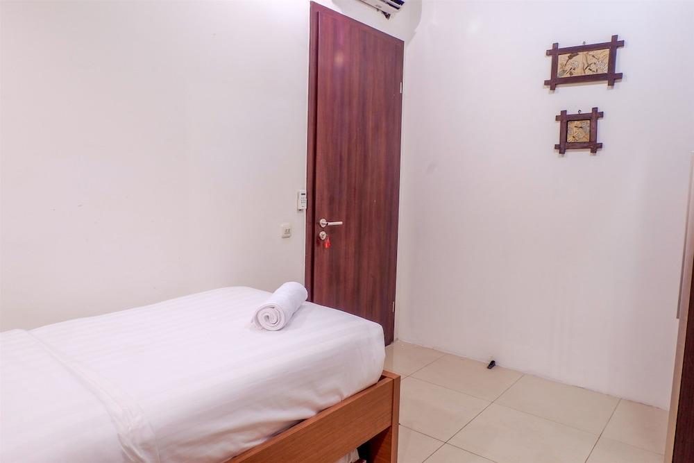 Cozy Pool View Kemang Village Residence Apartment with Direct Access to Mall Room