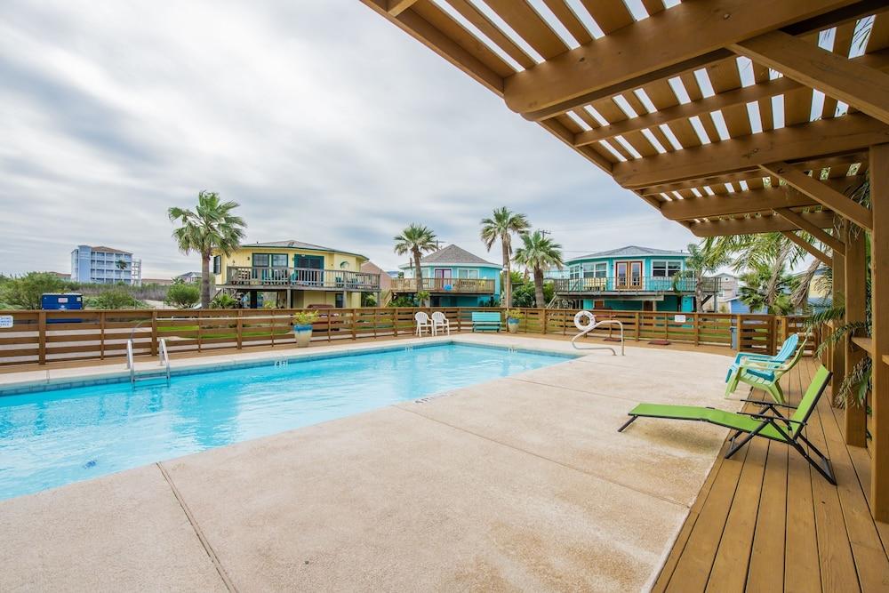 Island-style Beach Shak Home Steps to Community Pool by Redawning Waterslide