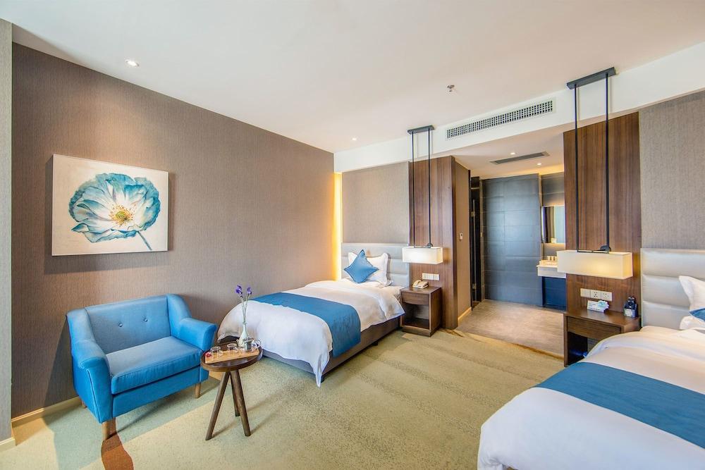 يونمان هوتل كنمينج دونجوا غرفة