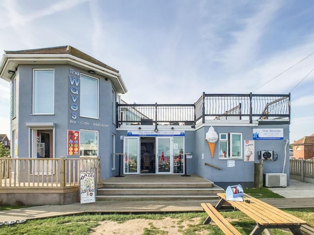 The Waves Bar Cafe B and B Hotel Featured Image