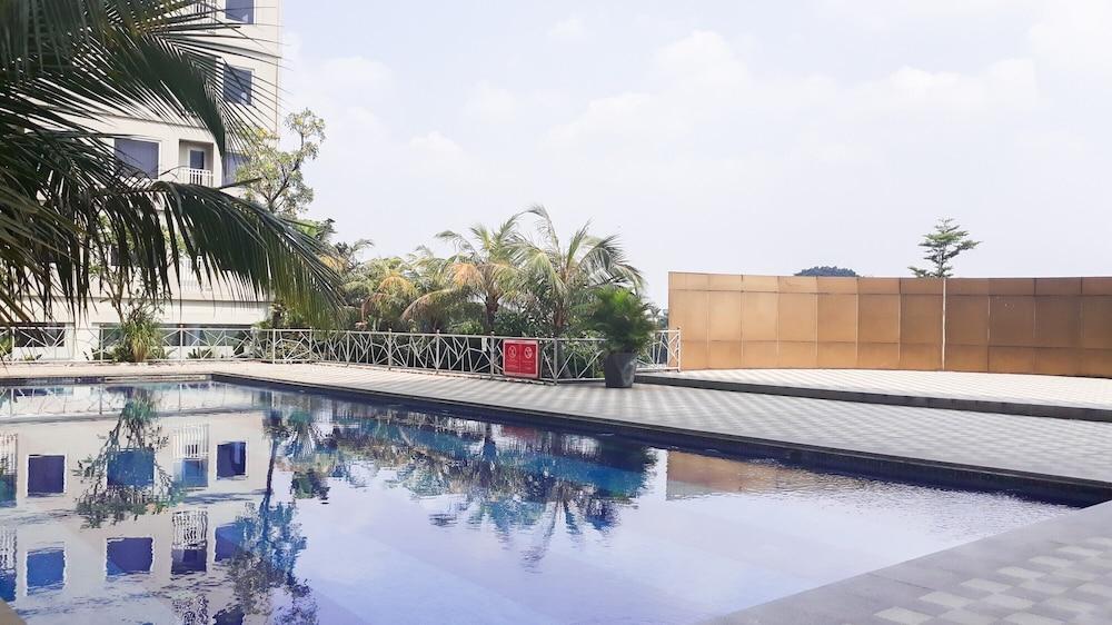 Cozy and Simply Studio Titanium Square Apartment Waterslide