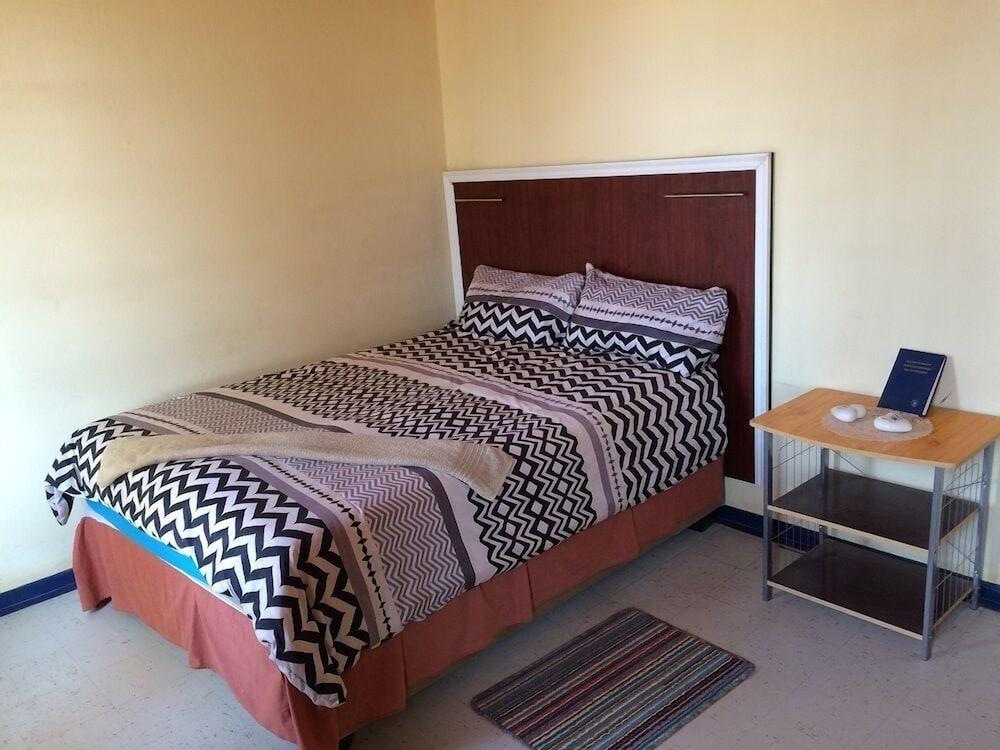 P Wake Guesthouse Room