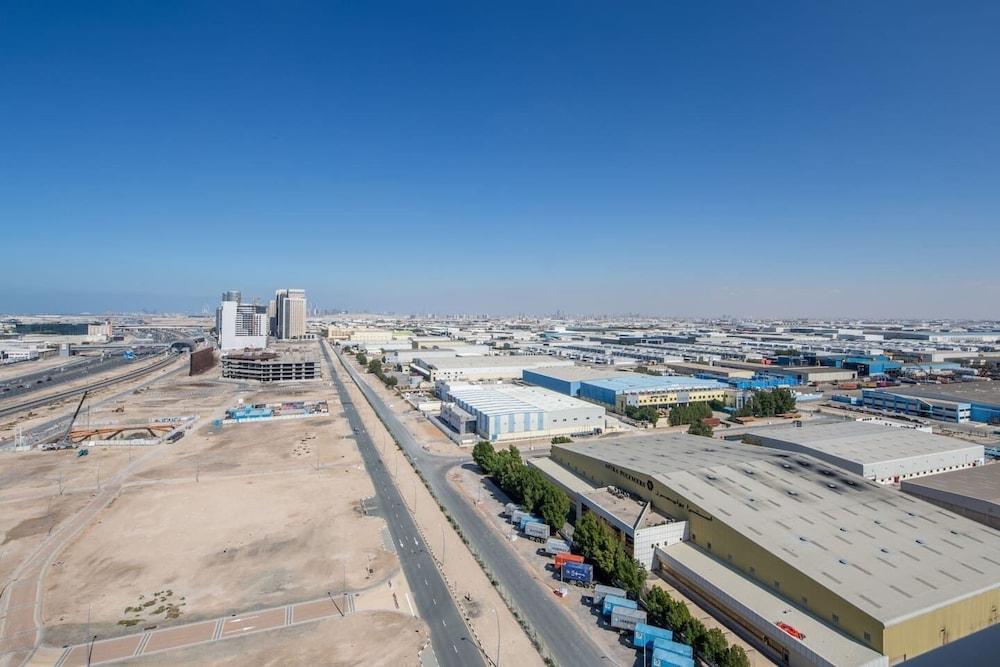 Modern Living In This 2BR Apt In The Heart of Downtown Jebel Ali - Sleeps 4! Aerial View