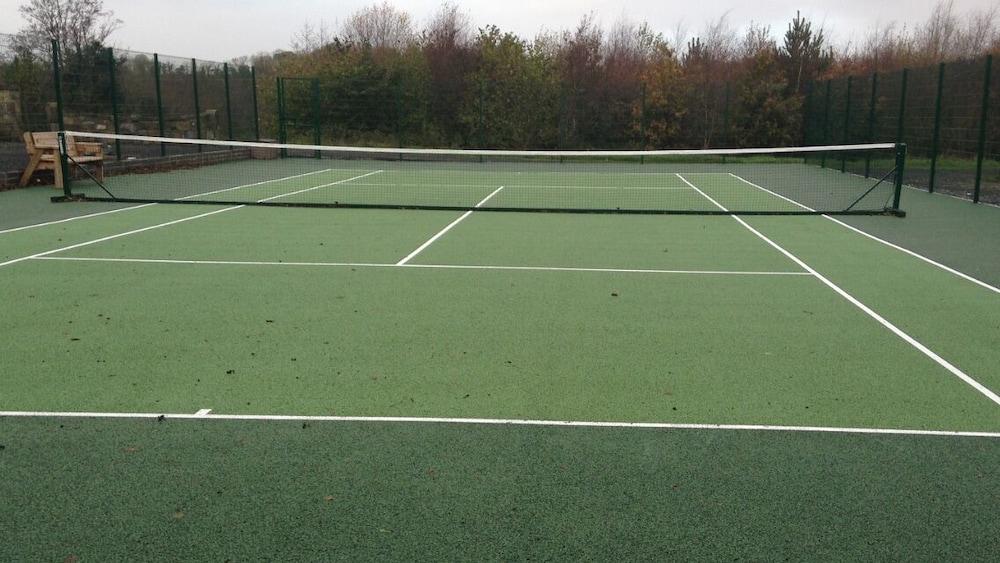The Gatehouse at Mullans Bay Tennis Court