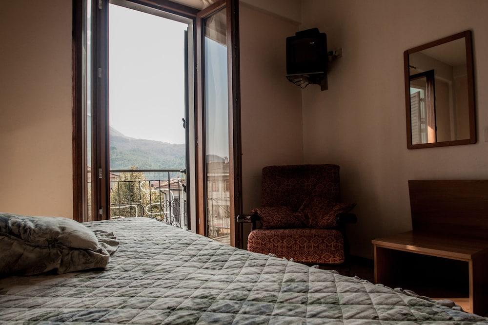 آلبيرجو ريستورانت بار بيرتوليني غرفة