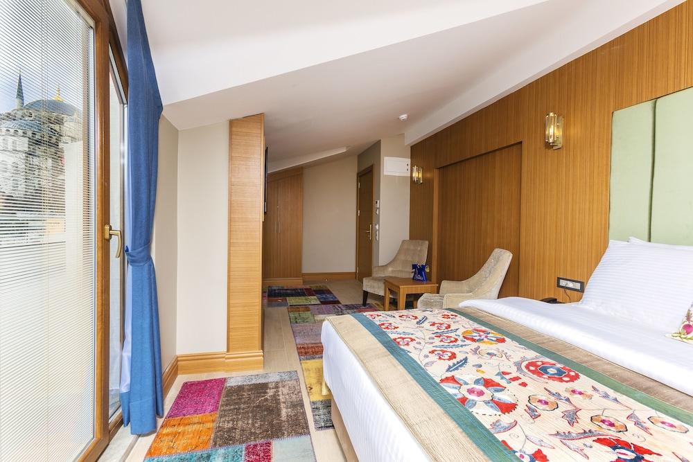 Obelisk Hotel & Suites - Room