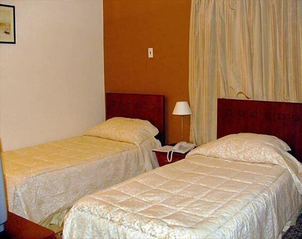 Golden Carven Hotel - Room