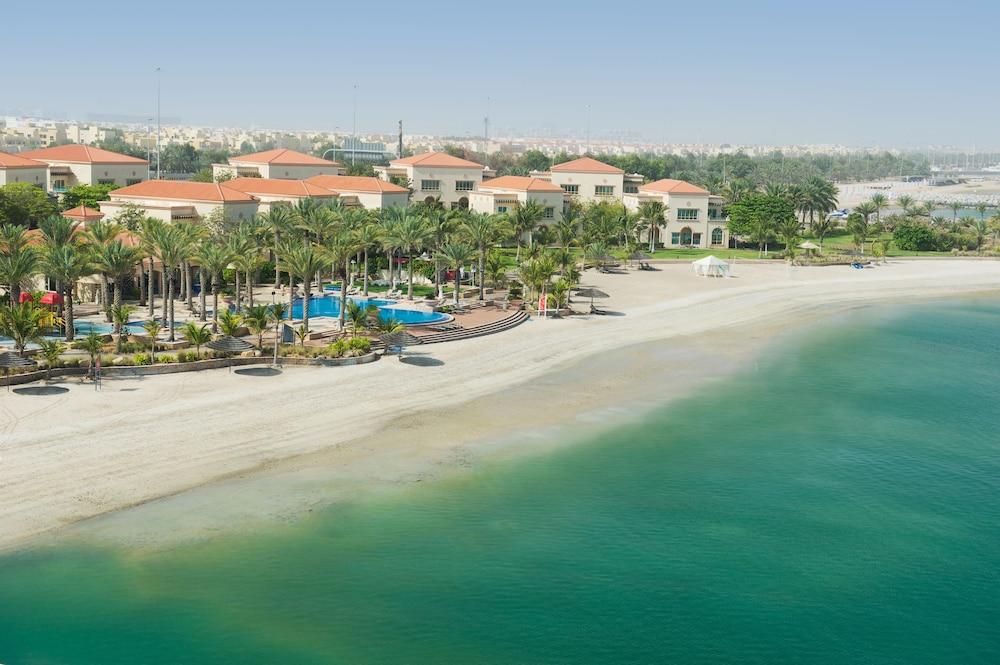Al Raha Beach Hotel Villas - Featured Image