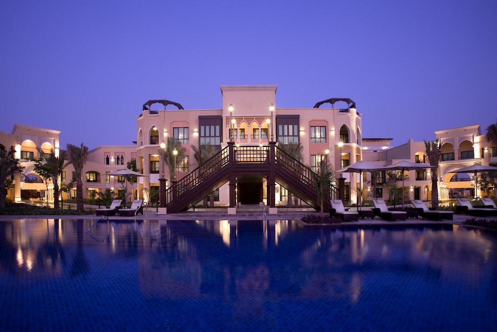 Shangri-La Hotel Apartments Qaryat Al Beri - Featured Image