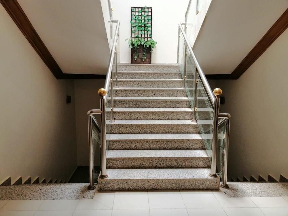 Sahat Al Bondoqia Furnished Apartments - Staircase