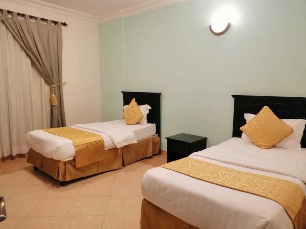 Sahat Al Bondoqia Furnished Apartments - Room