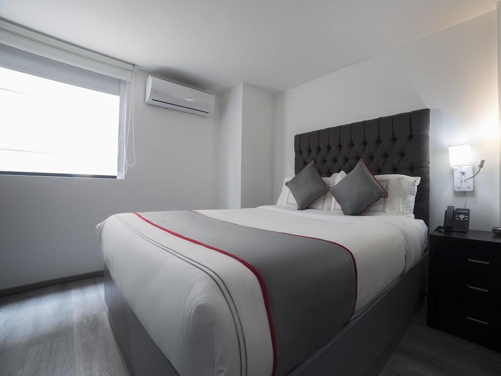 Suites Arboleda 215 - Room