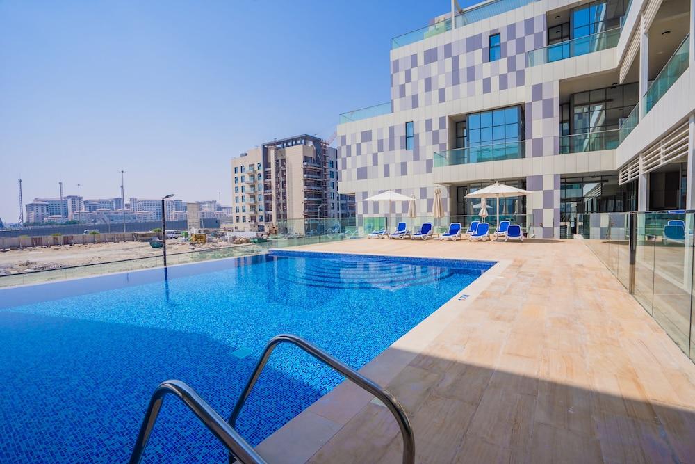 Nasma Luxury Stays - Al Raha Lofts 2 - Outdoor Pool