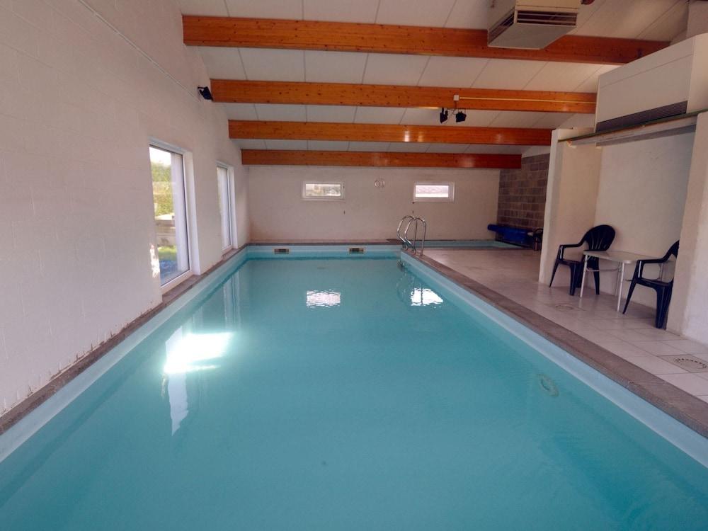 Quaint Holiday Home With Heated Indoor Pool - Featured Image