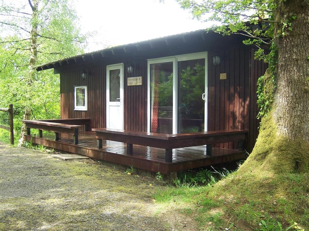 Honeysuckle Lodge set in a Beautiful 24 Acre Woodland Holiday Park - Featured Image