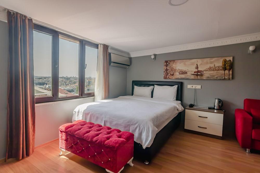 Zendy Suite Hotel - Room