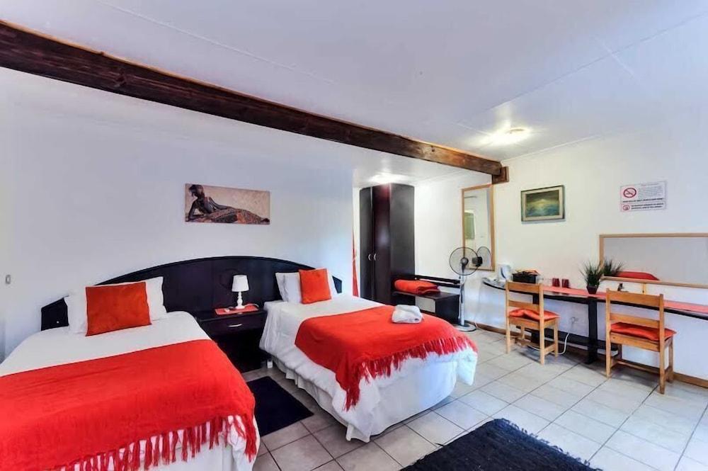 Amanzi Guest House - Featured Image