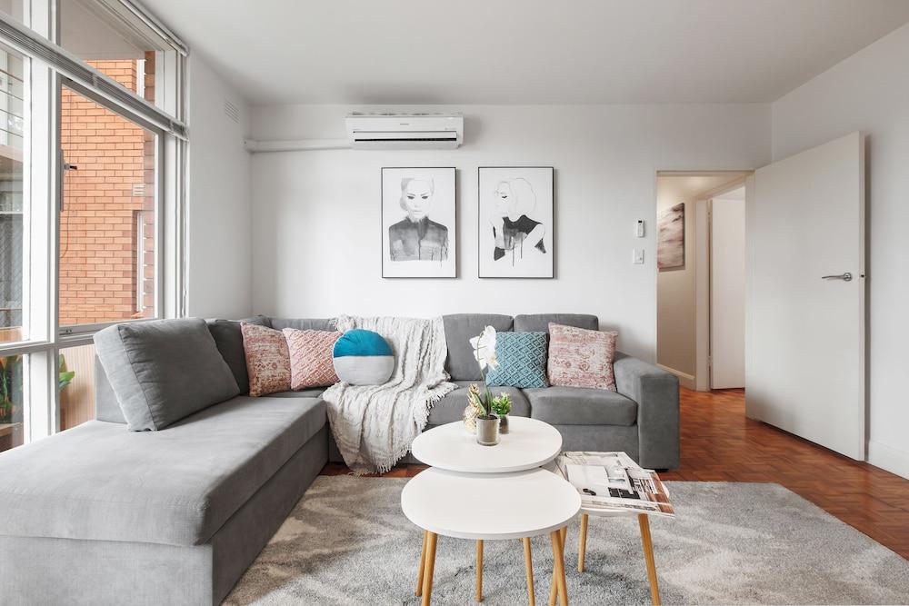 Balcony Retreat Apartment by Ready Set Host - Living Area