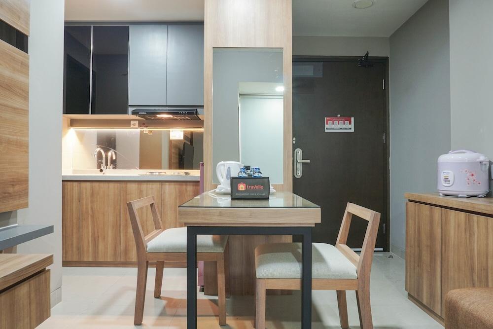 Elegant 1BR Apartment with Working Space Mustika Golf Residence - Room