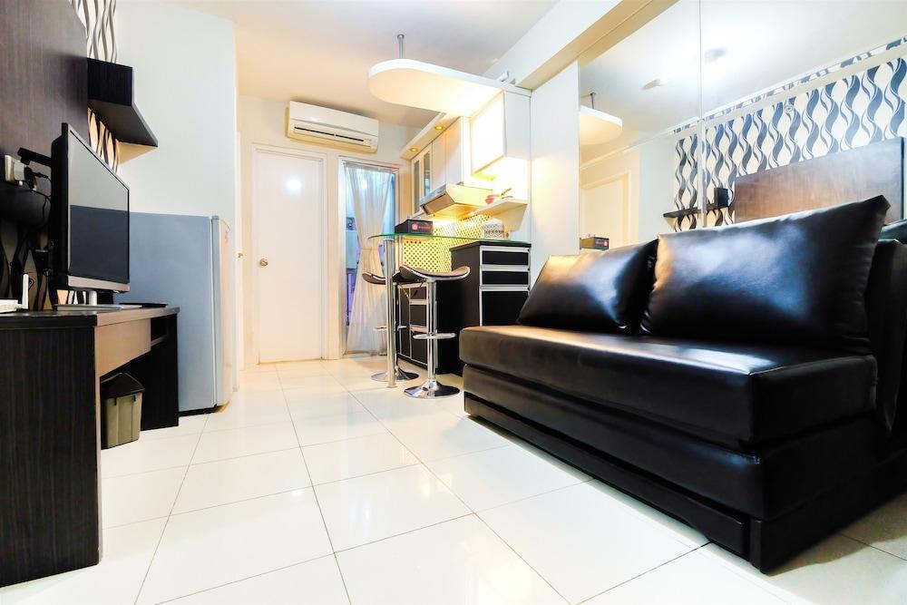 Monochrome Style 2 Bedrooms at Kalibata City Apartment By Travelio - Interior