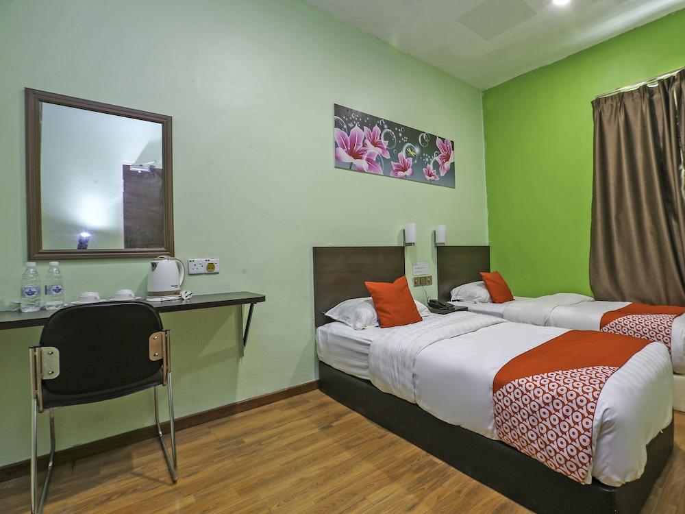 OYO 90099 G Home Hotel - Featured Image