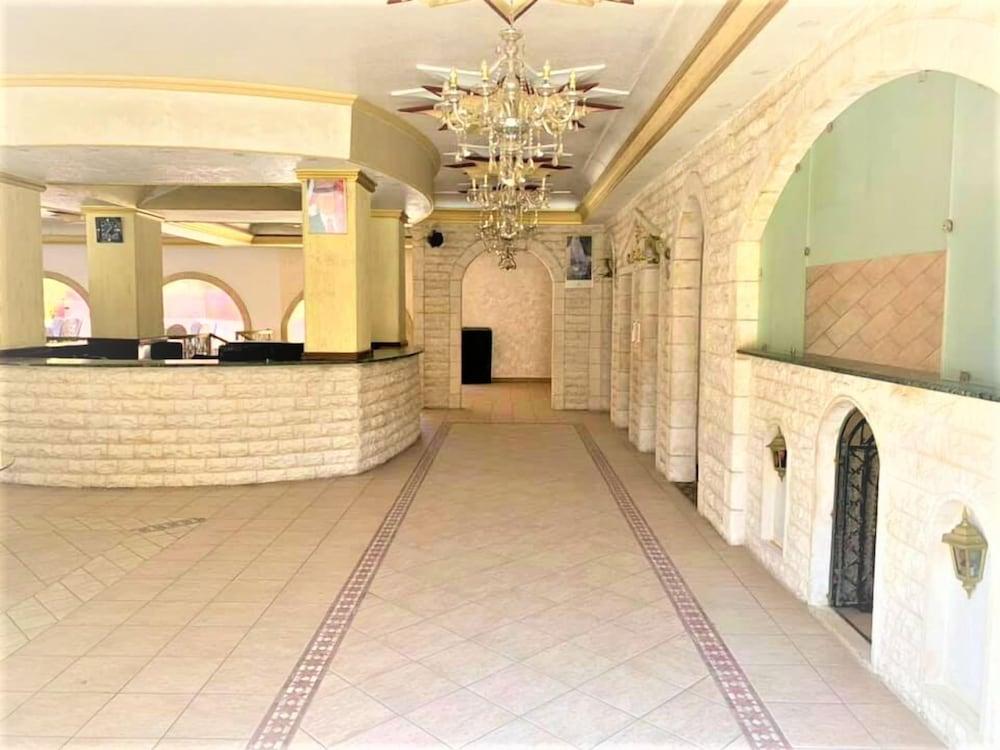 Al Nojoom International Hotel - Interior Entrance