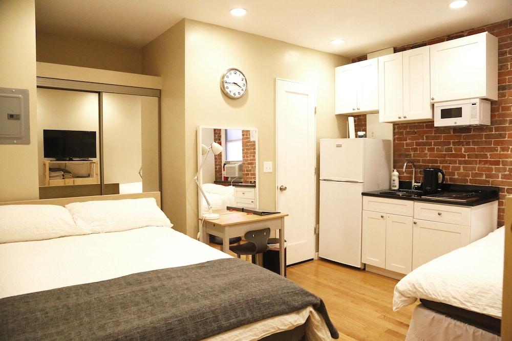 The Nomad Suites & Apartments - Room