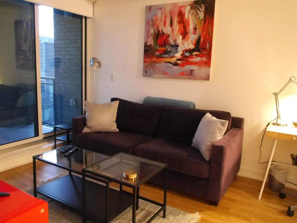 Attractive 2BR Condo with Balcony - Living Room