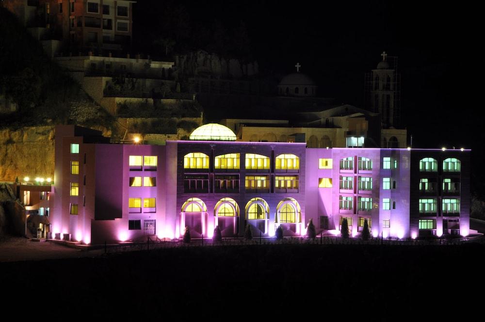 LIQAA Hotel - Featured Image