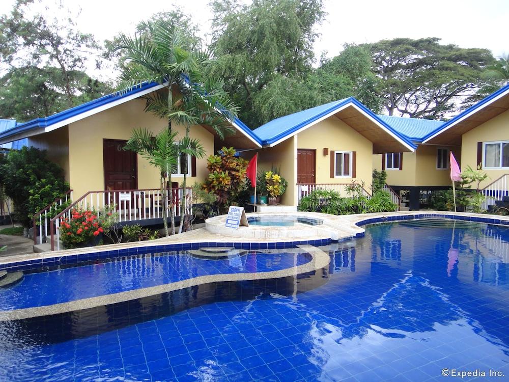 Blue Lagoon Inn & Suites - Featured Image