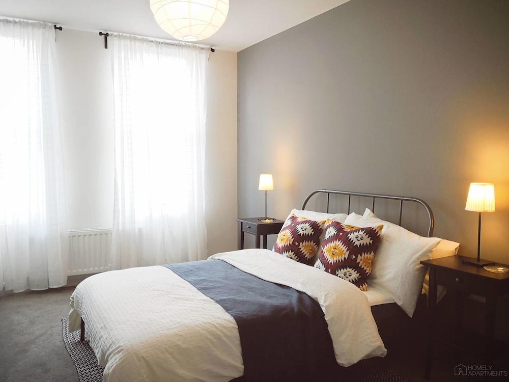 Homely Serviced Apartments - Figtree - Room