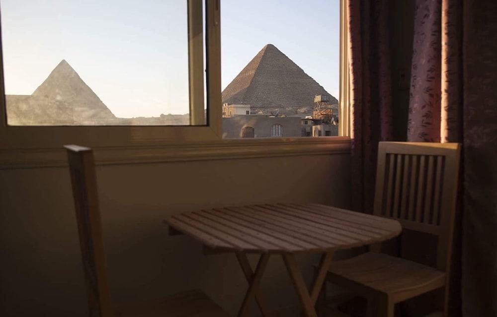 The Pyramids Inn Cheops - Featured Image