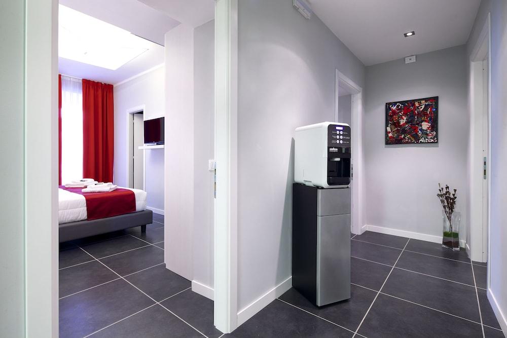 NearHome Smart Suites - Room