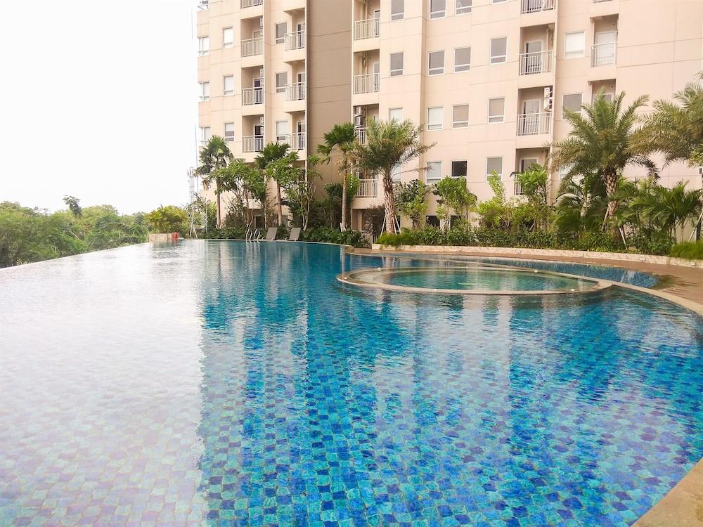 Elegant 1BR Apartment with Working Space Mustika Golf Residence - Pool