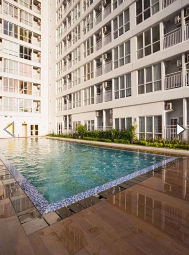 Apartemen Taman Melati Margonda by Winroom - Featured Image